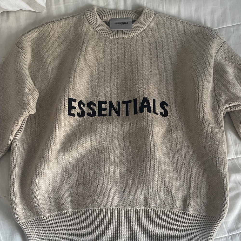Essentials Women’s Cream Crewneck Sweater with Black Logo